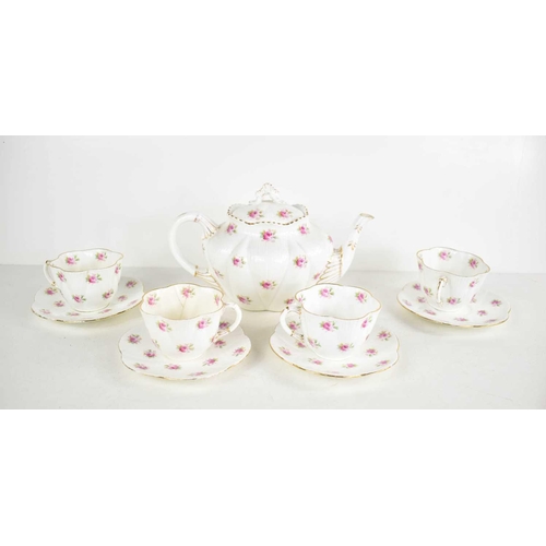 199 - A Foley porcelain part teaset comprising tea pot and four cups and saucers, makers mark to base The ... 