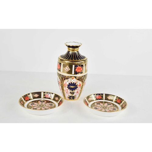 220 - Three pieces of Royal Crown Derby, in the Imari pattern no.1128, to include a vase and two pin dishe... 