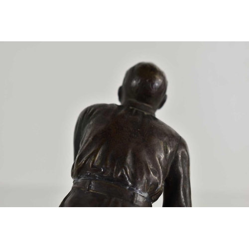 257 - An Art Deco bronze sculpture of a man bowling in the style of Schmidt Hofer, raised on a marble base... 