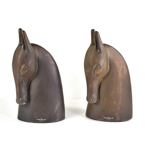 258 - A pair of vintage Anette Edmark ceramic horse head sculptures, 28cm high.