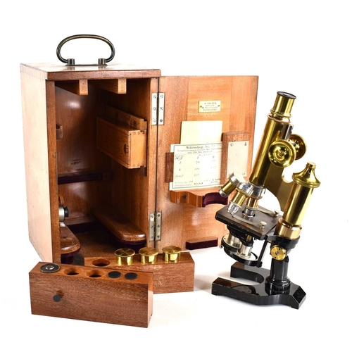 283 - An Ernst Leitz Wetzlar brass microscope, number 76153, with black-painted base in original finish, t... 