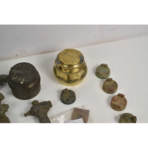 296 - A group of metal detecting finds and collectables to include two brass cart hub caps, Georgian decor... 