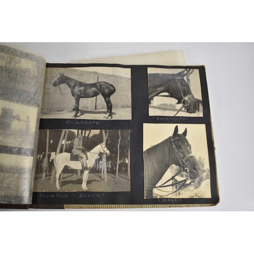 298 - A 1940s photograph album containing photos of King Faroulk presenting the Challenge Cup, Ferusiya Cl... 