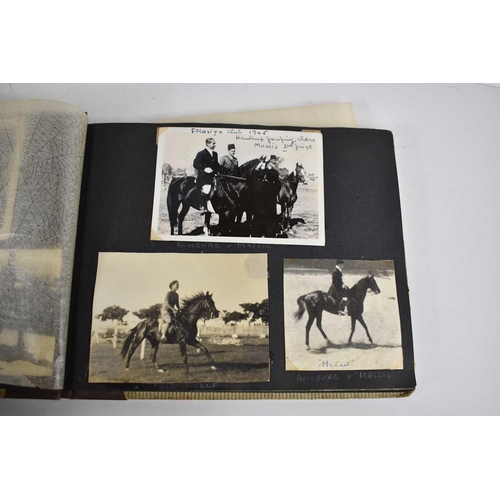 298 - A 1940s photograph album containing photos of King Faroulk presenting the Challenge Cup, Ferusiya Cl... 