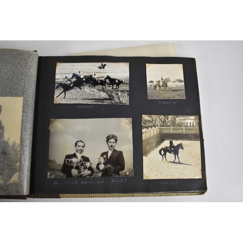 298 - A 1940s photograph album containing photos of King Faroulk presenting the Challenge Cup, Ferusiya Cl... 