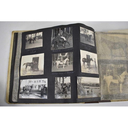 298 - A 1940s photograph album containing photos of King Faroulk presenting the Challenge Cup, Ferusiya Cl... 