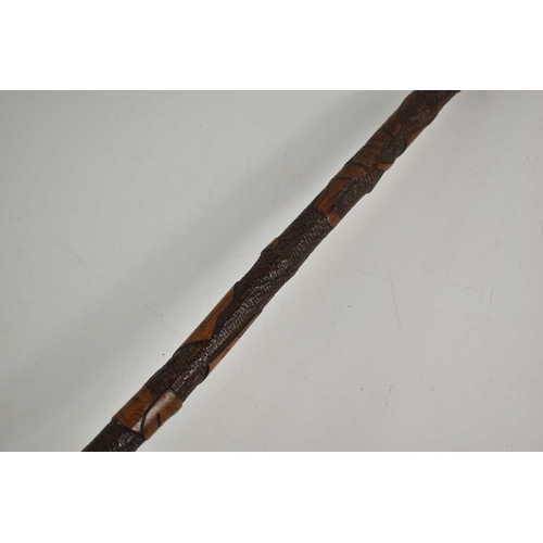 314 - A Japanese bamboo cane carved with warriors, 88cm