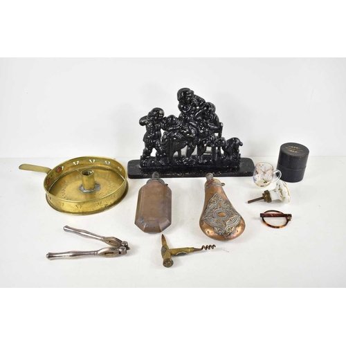 315 - A group of collectables to include two 19th century copper powder flasks, Royal Artillery trench art... 