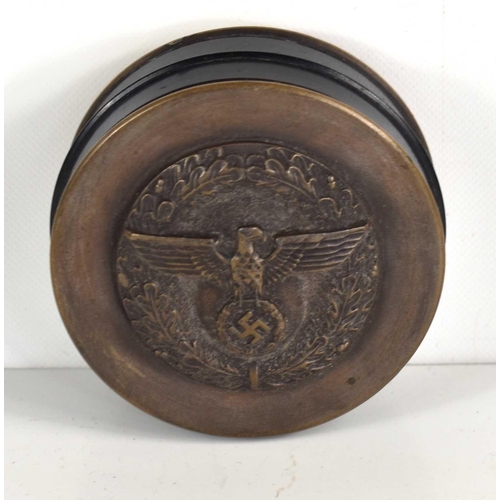 317 - A German snuff box, the removable screw lid relief decorated with eagle emblem.