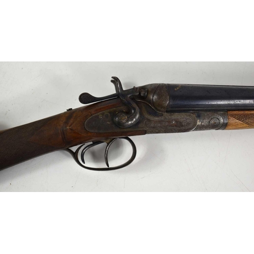 323 - An early 20th century double barrelled percussion shotgun made by Manufacture Liégeoise d’Armes à fe... 