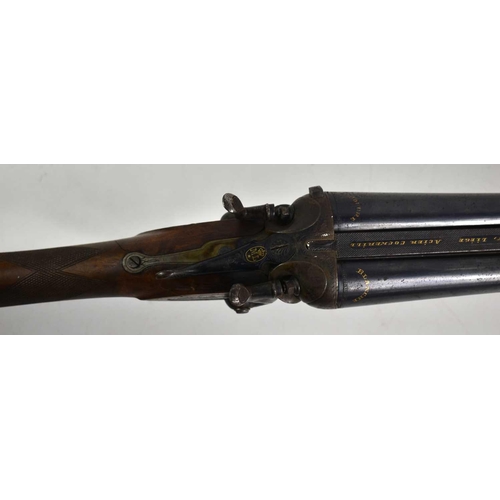 323 - An early 20th century double barrelled percussion shotgun made by Manufacture Liégeoise d’Armes à fe... 