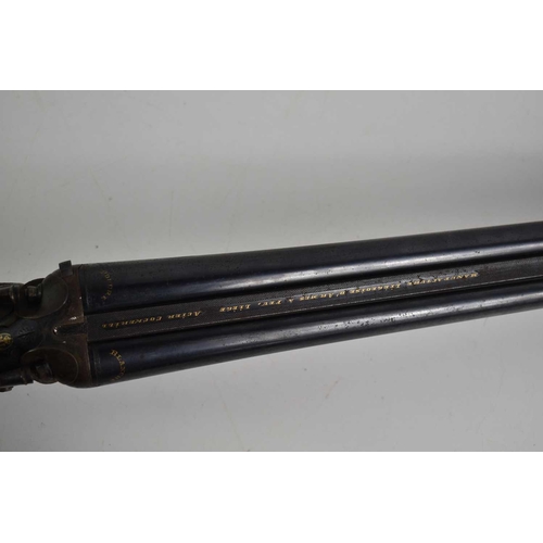 323 - An early 20th century double barrelled percussion shotgun made by Manufacture Liégeoise d’Armes à fe... 