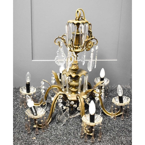 371 - A six branch vintage brass chandelier, with cut glass drops, converted to electric.