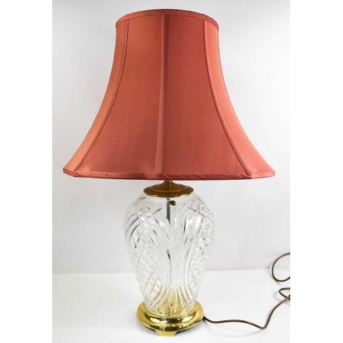 372 - A Waterford Crystal table lamp, with a pink shade, 44cm high (without shade).