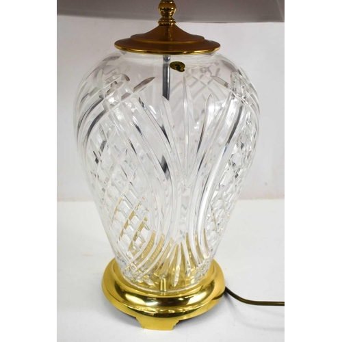 372 - A Waterford Crystal table lamp, with a pink shade, 44cm high (without shade).