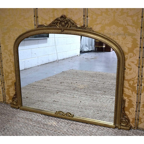 373 - A 20th century gilt wood overmantle mirror, 112cm by 146cm.