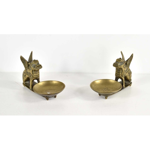 377 - A pair of Chinese brass incense burners in the form of Foo dog, 8cm high.