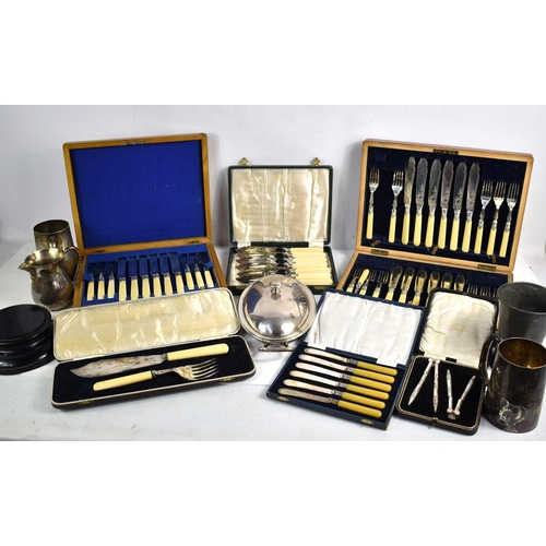 385 - A group of metal ware to include a canteen of silver plated fish knives and forks, a cased set of nu... 