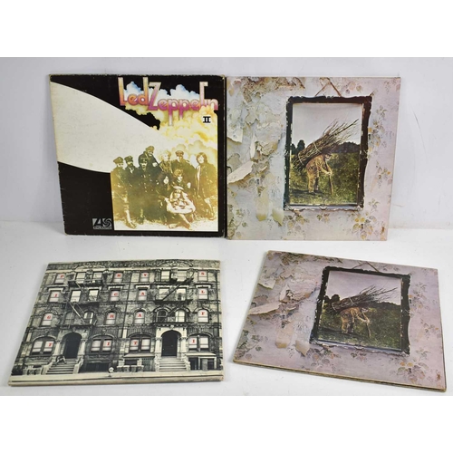 395 - Vinyl records: Four Led Zeppelin albums comprising Physical Graffiti, album number II and two copies... 