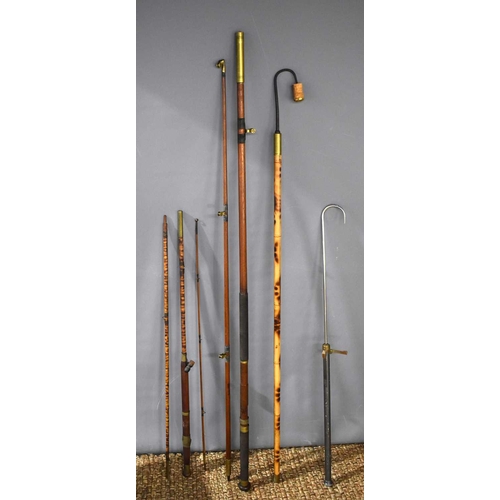 489 - An antique heavy duty fishing rod, likely sea or boat, with brass fittings, together with a Hardy Br... 