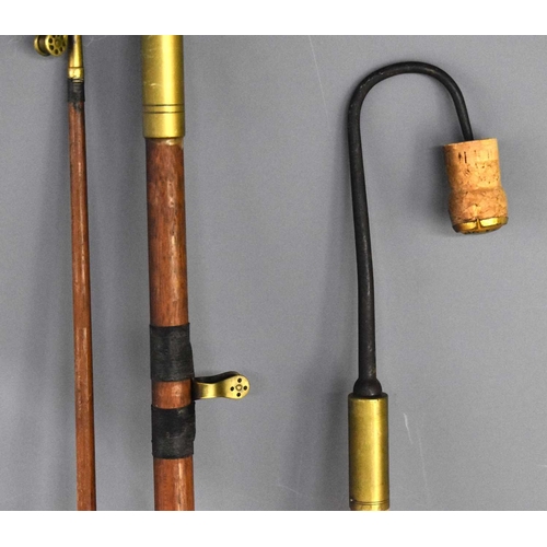 489 - An antique heavy duty fishing rod, likely sea or boat, with brass fittings, together with a Hardy Br... 