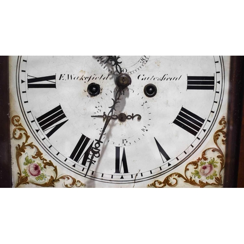 503 - A 19th century longcase clock by E Wakefield of Gateshead, the painted dial of gilt scrollwork and R... 