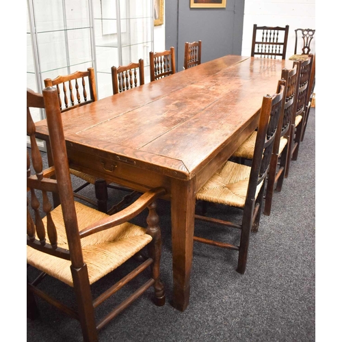 513 - A 19th century antique kitchen / dining table, the planked top with cleated ends and two end drawers... 