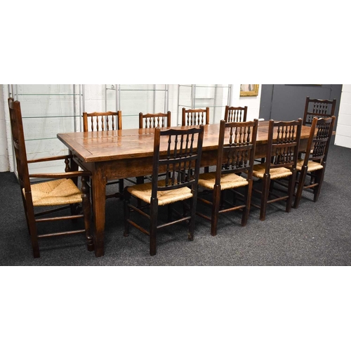 513 - A 19th century antique kitchen / dining table, the planked top with cleated ends and two end drawers... 