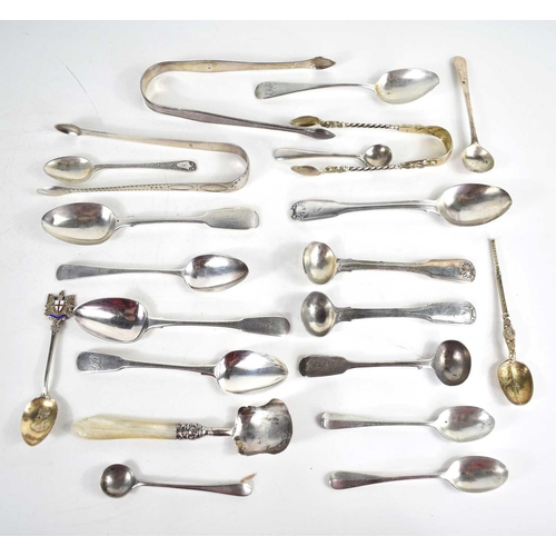 53 - A group of Georgian and later silver to include spoons and sugar nips, 10.7toz.