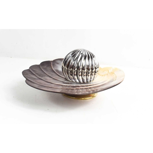 57 - An unusual Victorian silver inkwell and stand, the well set within a fluted sphere, placed on a carv... 