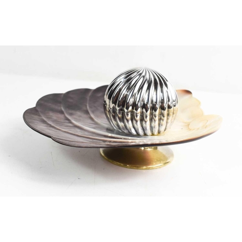 57 - An unusual Victorian silver inkwell and stand, the well set within a fluted sphere, placed on a carv... 