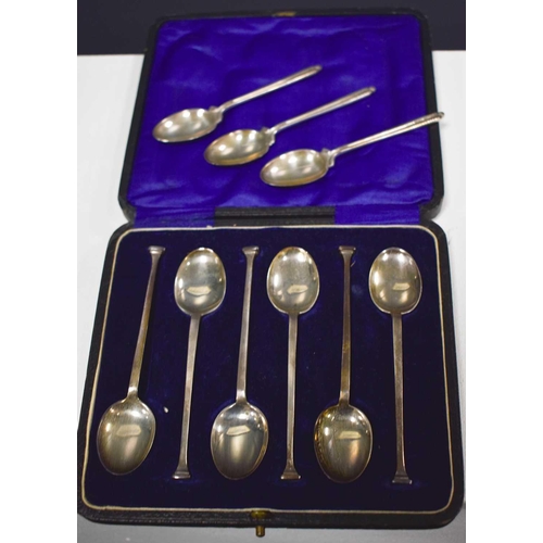 6 - A set of silver coffee spoons, Sheffield 1921, 2.24toz, and three silver coffee spoons by Walker & H... 