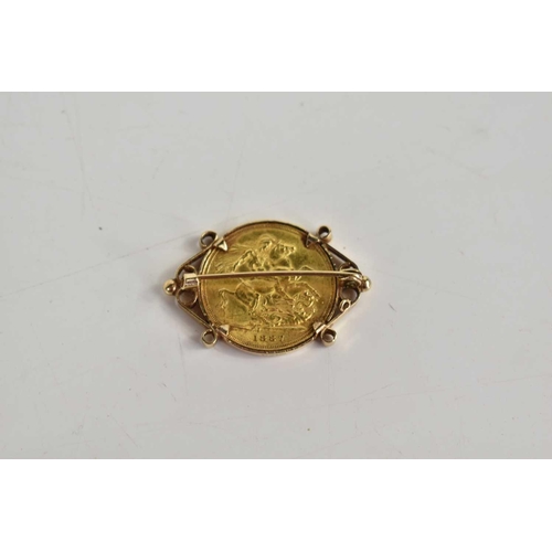 86 - A Queen Victorian full gold sovereign dated 1887, mounted on a 9ct gold brooch, 10.4g.