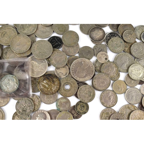 99 - A collection of GB and worldwide coinage, some silver to include a Maria Theresa 1780 Thaler, some p... 