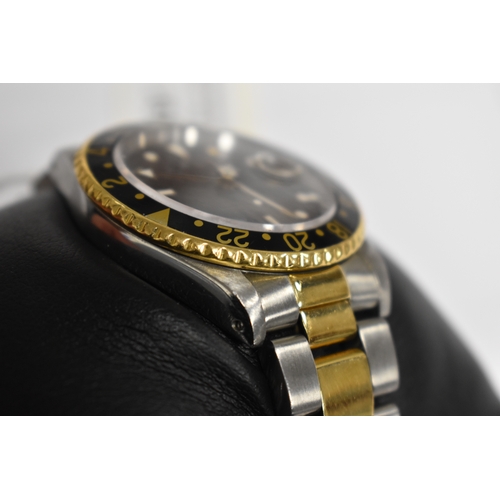 391 - A Rolex GMT Master II Oyster Perpetual gentleman's automatic wristwatch, calibre 3185, black dial wi... 