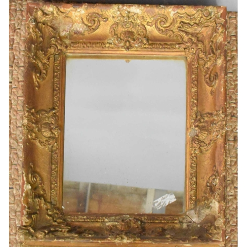 246 - A 19th century gold painted wall mirror, with decorative mouldings, A/F, 39 by 30cm.