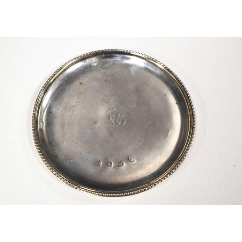 11 - A Georgian silver wine stand, with a beaded edge, engraved with monogram, 1.8toz.