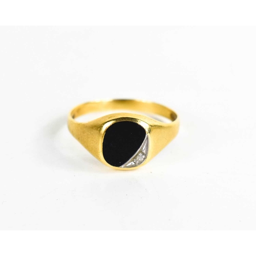 154 - An 18ct gold signet ring, set with black agate and a diamond, size T, 2.18g.