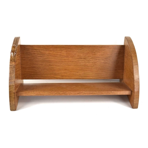 261 - A Robert 'Mouseman' Thompson oak book trough, with carved mouse trademark, 45.5cm.