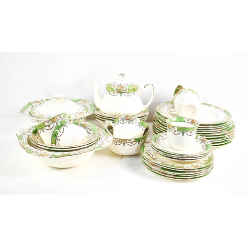 354 - CHARITY LOT: An Alfred Meakin part tea and dinner service, in the solway pattern, including plates, ... 