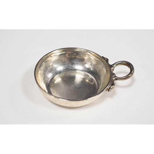 4 - A rare 18th century period silver wine tasting cup, French, the handle having an indistinct mark, th... 