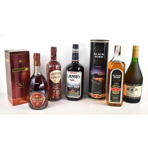 62 - A group of alcohol comprising Black Bush Irish whisky, Lamb's Navy rum, Three Barrels 15 year old Fr... 