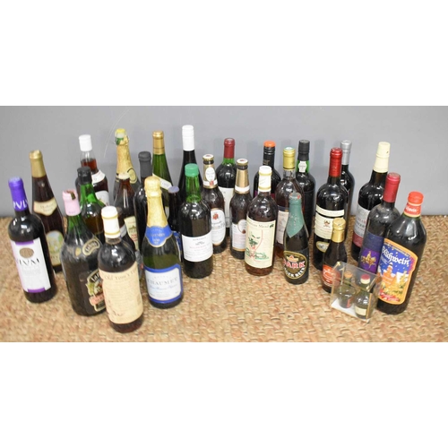 75 - A selection of vintage and later beers, wine, sherry, and other alcoholic drinks.