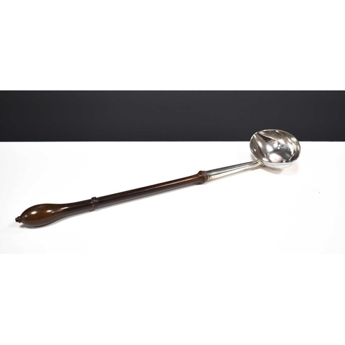 8 - A Georgian silver and fruitwood wine ladle engraved 'W.P to W.C' to the underside of the bowl, indis... 