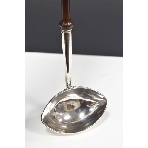 8 - A Georgian silver and fruitwood wine ladle engraved 'W.P to W.C' to the underside of the bowl, indis... 