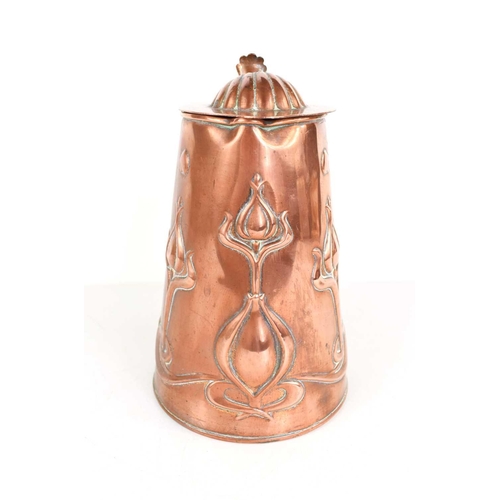 111 - An Arts and Crafts copper jug by Joseph Sankey & Sons, with embossed stylised tulip anbd heart decor... 