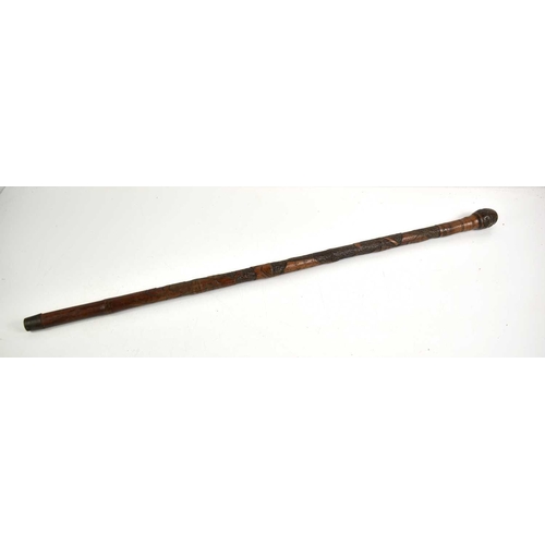 136a - A Japanese bamboo cane carved with warriors, 88cm