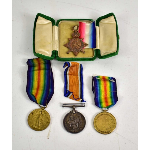 137 - A group of WWI medals to include a 1914 Star awarded to Gunner P.H Stephenson, a Victory medal award... 