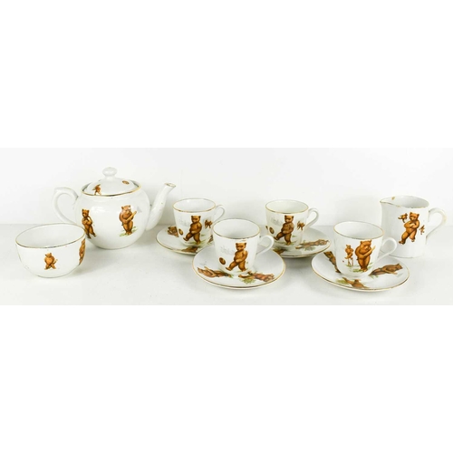 14 - A Booths China childrens tea set in the Teddy Bears Picnic pattern, comprising teapot, four cups & s... 