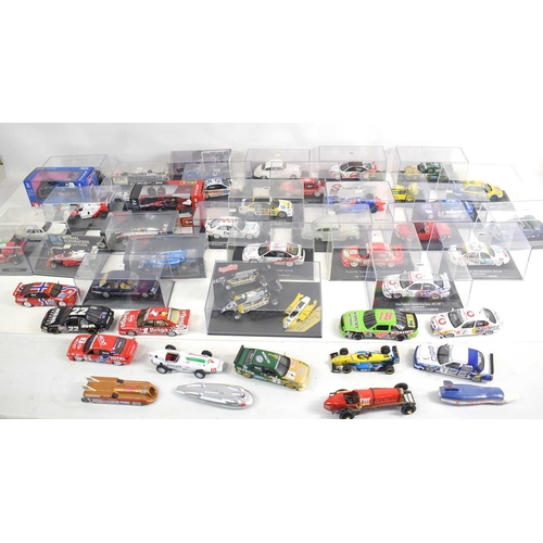 17 - A group of diecast cars to include examples made by Lledo, Burago and Onyx, loose and in boxes.